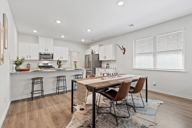 1512 Bennington Ln, Celina, TX 75009 - dining area with recessed lighting and light wood finished floors