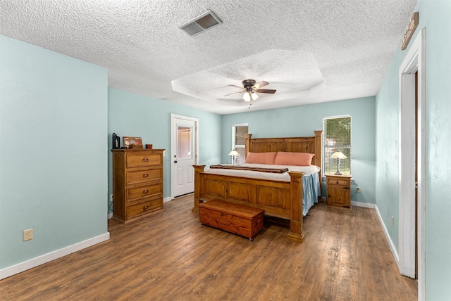 4610 County Road 862, Mckinney, TX 75071 - bedroom with wood finished floors, a textured ceiling, and ceiling fan