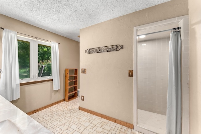 4610 County Road 862, Mckinney, TX 75071 - bathroom featuring a textured ceiling and a shower stall