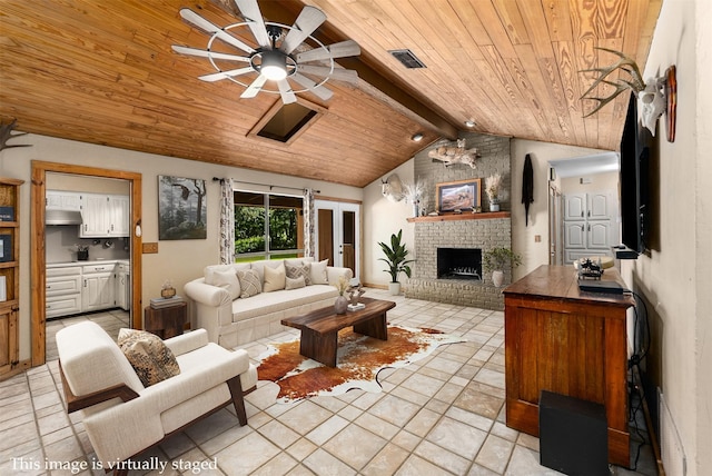 4610 County Road 862, Mckinney, TX 75071 - living room featuring wood ceiling, ceiling fan, and a brick fireplace