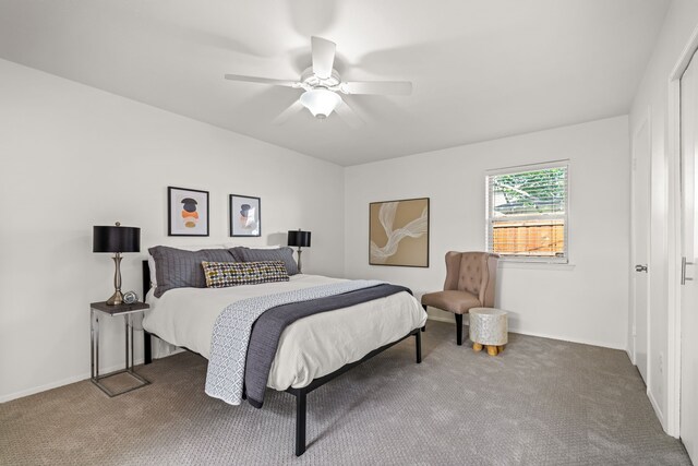 10305 Robindale Dr, Dallas, TX 75238 - carpeted bedroom featuring ceiling fan and baseboards