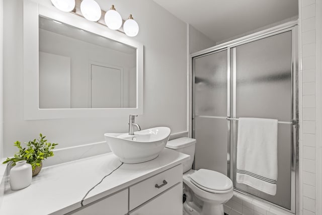 10305 Robindale Dr, Dallas, TX 75238 - bathroom featuring a shower stall and vanity