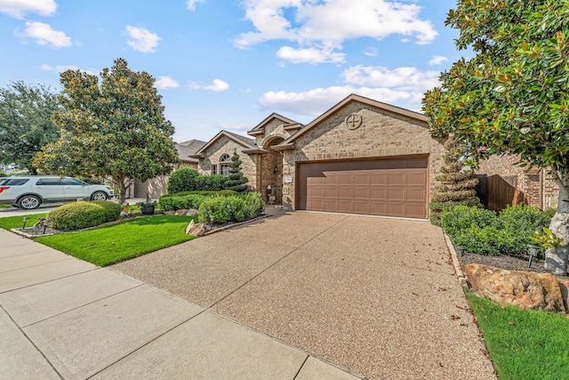 2705 Albatross Ln, Fort Worth, TX 76177 - view of front of property with concrete driveway, an attached garage, brick siding, and stone siding