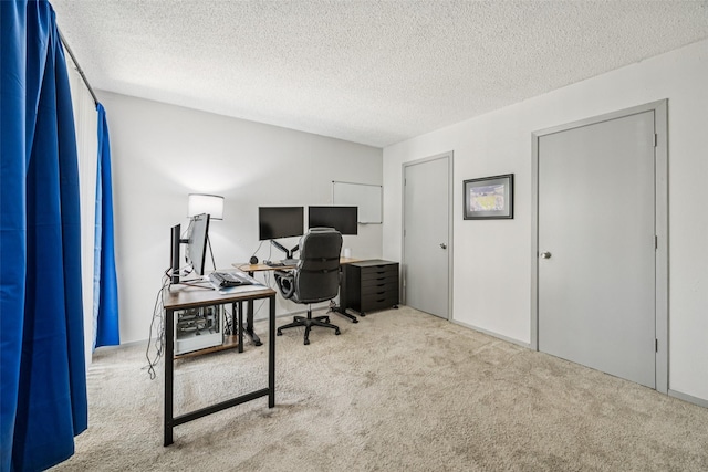6050 Melody Ln Unit 107, Dallas, TX 75231 - carpeted home office with a textured ceiling
