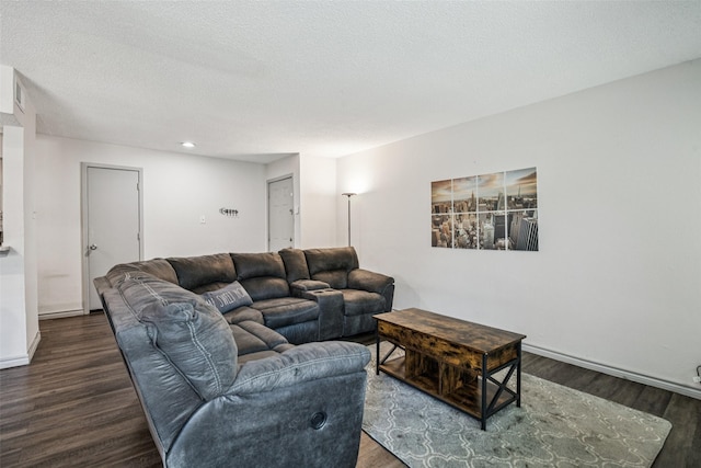 6050 Melody Ln Unit 107, Dallas, TX 75231 - living room with wood finished floors, a textured ceiling, and recessed lighting