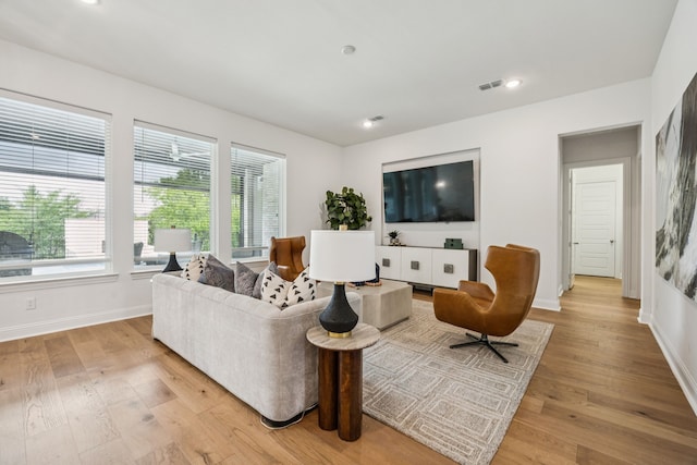 307 Misty Ln, Argyle, TX 76226 - living room featuring light wood-type flooring and recessed lighting