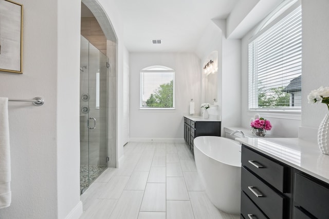 307 Misty Ln, Argyle, TX 76226 - full bathroom with vanity, plenty of natural light, and a stall shower