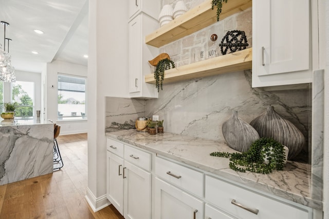 307 Misty Ln, Argyle, TX 76226 - kitchen with white cabinets, open shelves, backsplash, light wood-style floors, and recessed lighting
