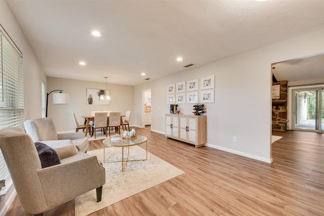 640 Silverstone Dr, Richardson, TX 75080 - living room with light wood-style flooring and recessed lighting