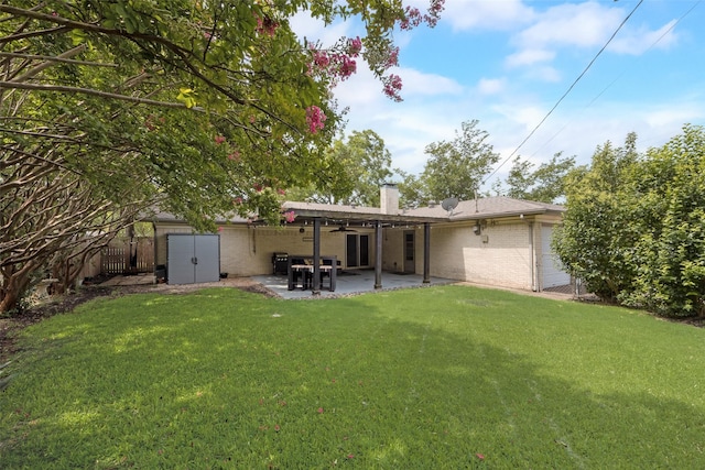 640 Silverstone Dr, Richardson, TX 75080 - rear view of property featuring brick siding, a chimney, a patio, and a ceiling fan