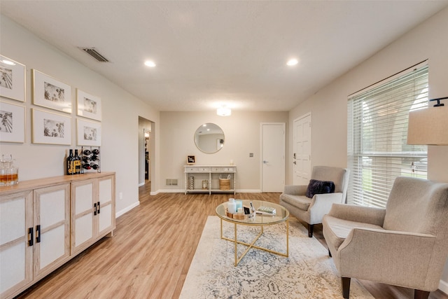 640 Silverstone Dr, Richardson, TX 75080 - living room featuring light wood-style floors and recessed lighting