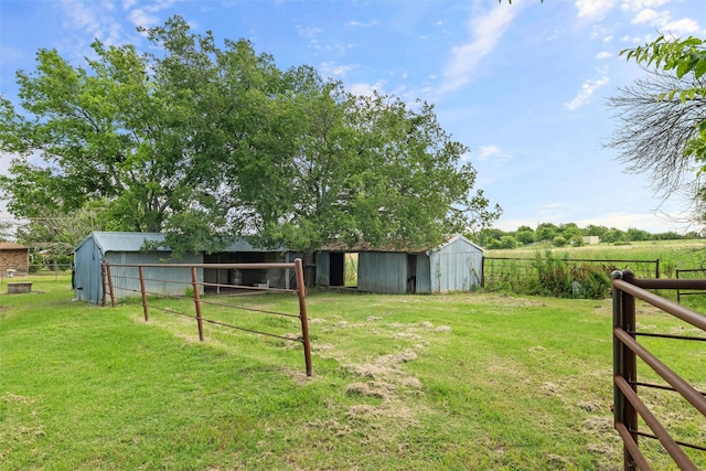 7220 Tucker Dr, Weatherford, TX 76085 - view of yard featuring an outbuilding