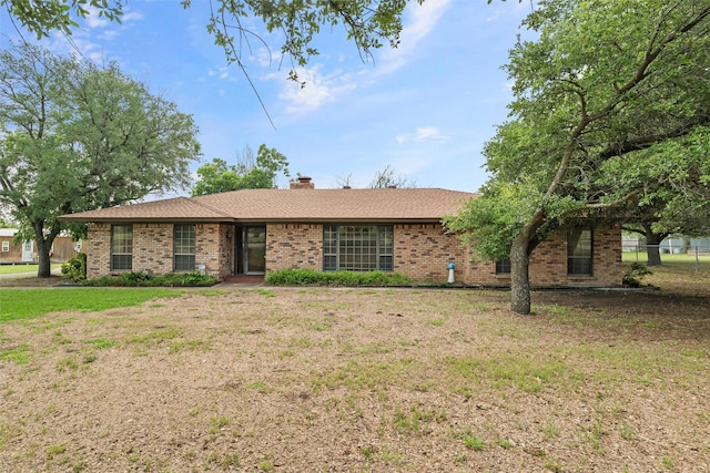 7220 Tucker Dr, Weatherford, TX 76085 - single story home featuring brick siding and a chimney