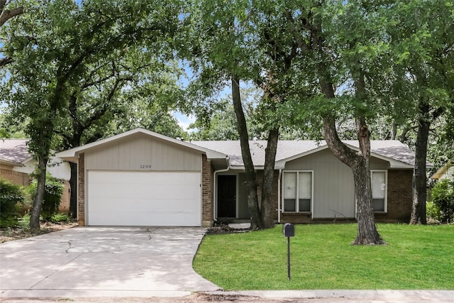 1209 Pin Oak Dr, Denton, TX 76209 - ranch-style home with a garage, driveway, a front yard, and brick siding