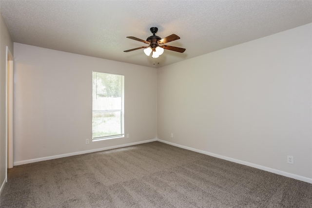 1209 Pin Oak Dr, Denton, TX 76209 - empty room featuring a ceiling fan, carpet floors, and a textured ceiling