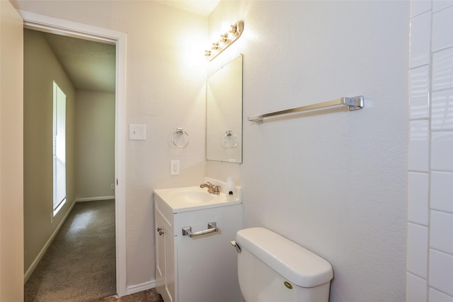 1209 Pin Oak Dr, Denton, TX 76209 - half bath featuring vanity and toilet