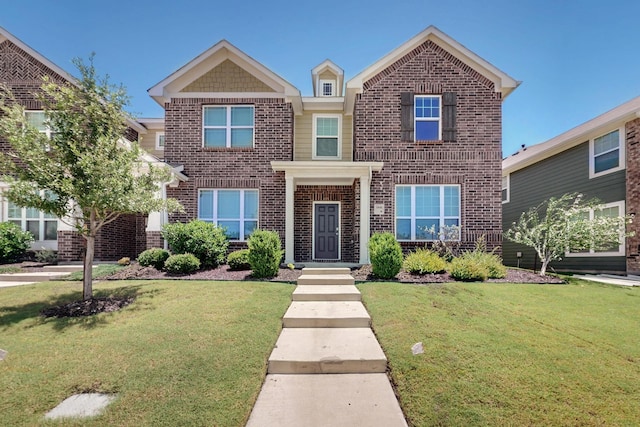1848 Indigo Ln, Forney, TX 75126 - view of front of home featuring brick siding and a front lawn