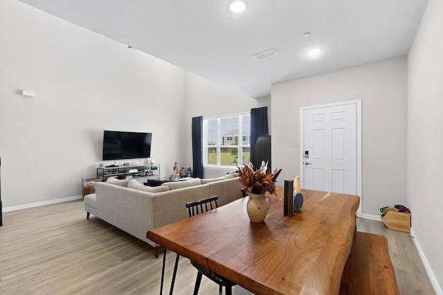 1848 Indigo Ln, Forney, TX 75126 - dining space featuring light wood finished floors, recessed lighting, and lofted ceiling