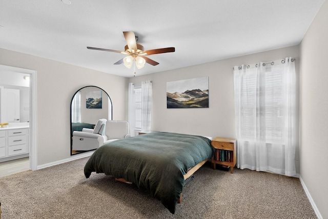 1848 Indigo Ln, Forney, TX 75126 - bedroom featuring light colored carpet, ensuite bathroom, and ceiling fan