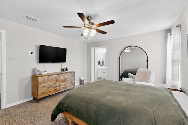 1848 Indigo Ln, Forney, TX 75126 - carpeted bedroom with a ceiling fan and ensuite bath