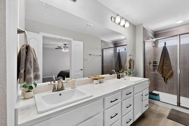 1848 Indigo Ln, Forney, TX 75126 - bathroom with ensuite bath, healthy amount of natural light, double vanity, and a stall shower