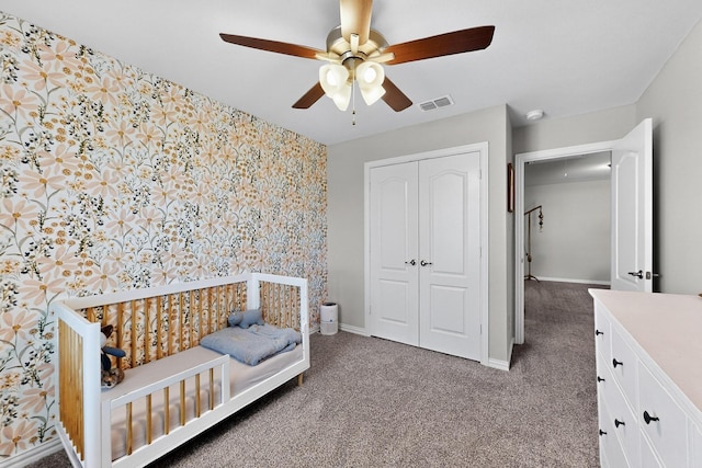 1848 Indigo Ln, Forney, TX 75126 - carpeted bedroom featuring a closet, wallpapered walls, and ceiling fan