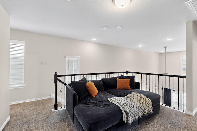 1848 Indigo Ln, Forney, TX 75126 - living area featuring carpet floors, an upstairs landing, and recessed lighting