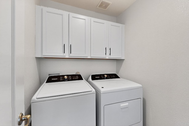 1848 Indigo Ln, Forney, TX 75126 - washroom with cabinet space and washer and clothes dryer