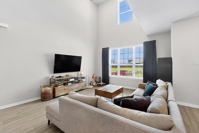 1848 Indigo Ln, Forney, TX 75126 - living area featuring wood finished floors and a towering ceiling