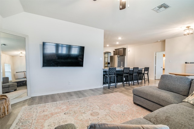 276 Jefferson Ln, Fate, TX 75189 - living room with light wood finished floors, ceiling fan, recessed lighting, and lofted ceiling