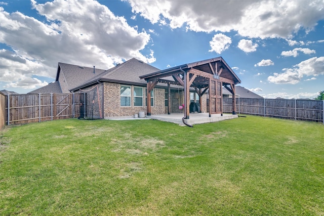 276 Jefferson Ln, Fate, TX 75189 - rear view of house with a patio, brick siding, and a fenced backyard