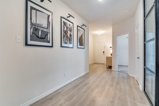 276 Jefferson Ln, Fate, TX 75189 - hallway featuring light wood-style flooring and baseboards