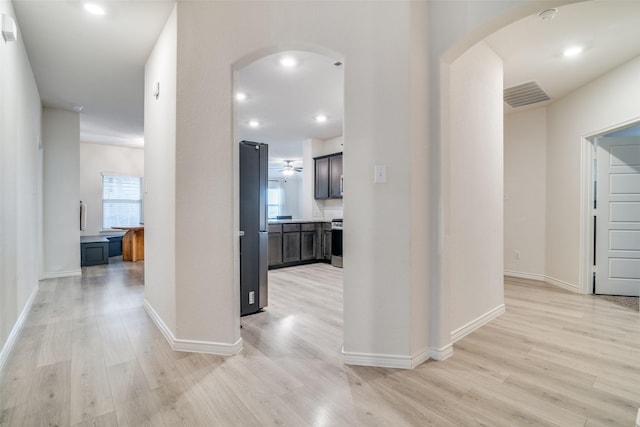 276 Jefferson Ln, Fate, TX 75189 - hall with arched walkways, light wood finished floors, and recessed lighting