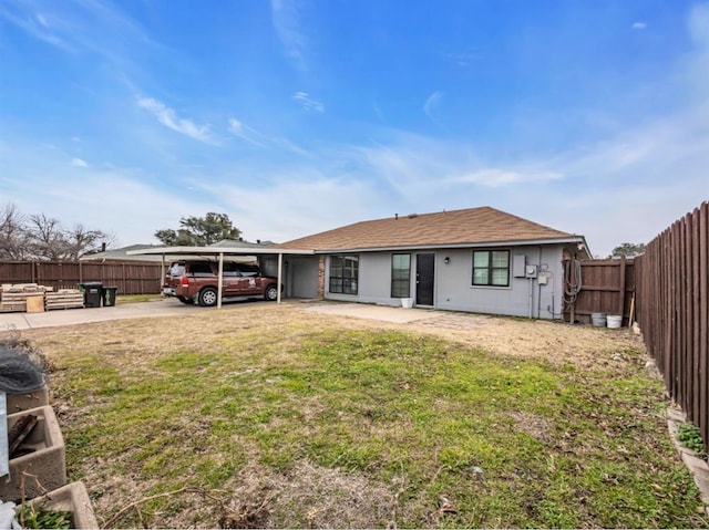 1013 Huntersglen Dr, Mesquite, TX 75150 - back of property with a fenced backyard and driveway
