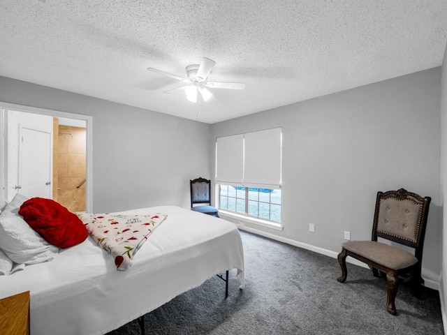 1013 Huntersglen Dr, Mesquite, TX 75150 - carpeted bedroom with a textured ceiling and ceiling fan