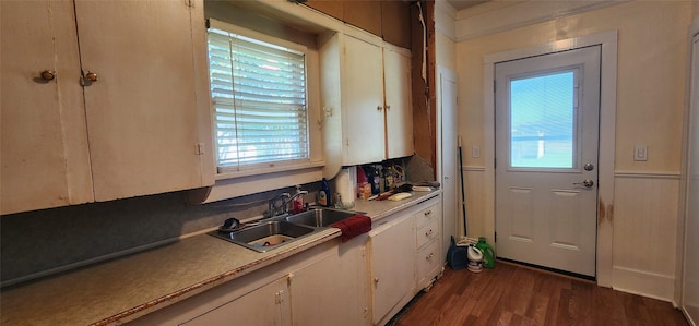 108 S Bonham St, Mexia, TX 76667 - kitchen with white cabinets, dark wood-style floors, and light countertops