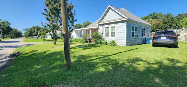 108 S Bonham St, Mexia, TX 76667 - view of home's exterior featuring a lawn