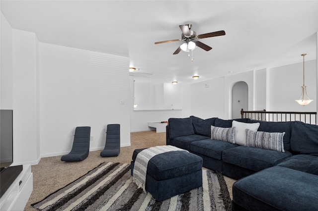 14800 Star Creek Dr, Aledo, TX 76008 - carpeted living area featuring a ceiling fan and arched walkways