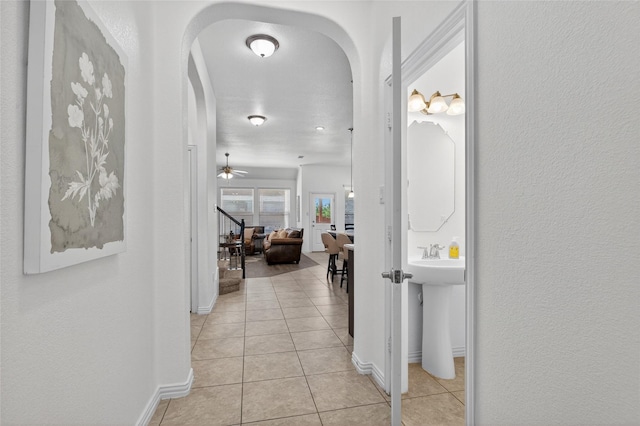 14800 Star Creek Dr, Aledo, TX 76008 - corridor with arched walkways and light tile patterned floors
