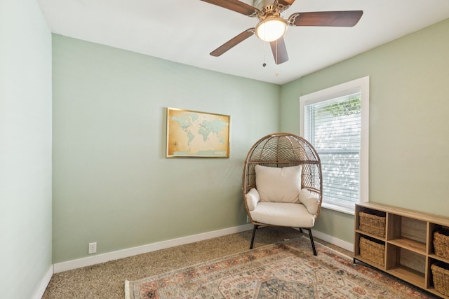 5029 Jerri Ln, Haltom City, TX 76117 - living area featuring carpet flooring and a ceiling fan