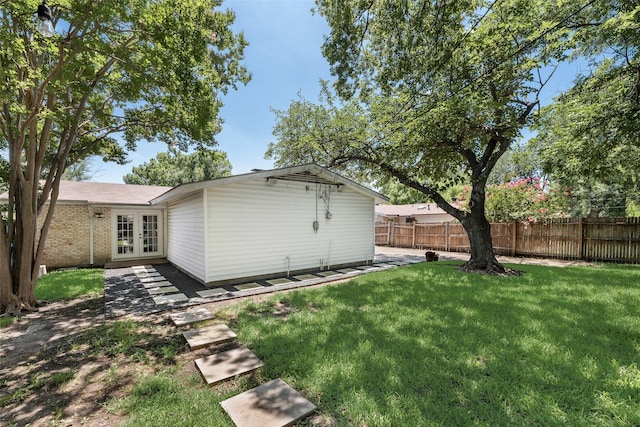714 Silverstone Dr, Richardson, TX 75080 - rear view of property featuring french doors and brick siding