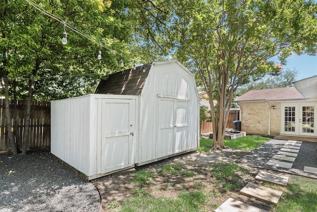 714 Silverstone Dr, Richardson, TX 75080 - view of shed with french doors and a fenced backyard