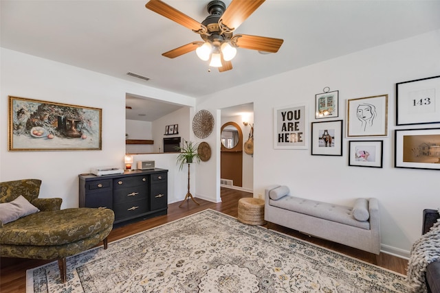 714 Silverstone Dr, Richardson, TX 75080 - living area with dark wood-style floors and a ceiling fan