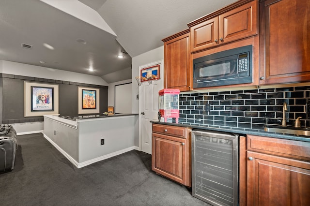 1829 Lewis Crossing Dr, Keller, TX 76248 - kitchen with wine cooler, lofted ceiling, black microwave, backsplash, and dark colored carpet