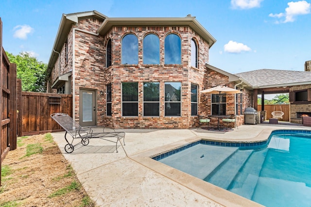 1829 Lewis Crossing Dr, Keller, TX 76248 - rear view of house with a patio, brick siding, and a fenced backyard