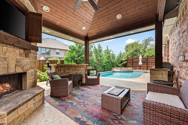 1829 Lewis Crossing Dr, Keller, TX 76248 - fenced backyard with a patio area, a ceiling fan, an in-ground hot tub, a gazebo, and an outdoor living space with a fireplace