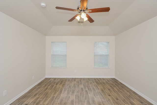 3153 Evangeline Rd, Fort Worth, TX 76140 - empty room featuring wood finished floors, a ceiling fan, a smoke detector, and lofted ceiling