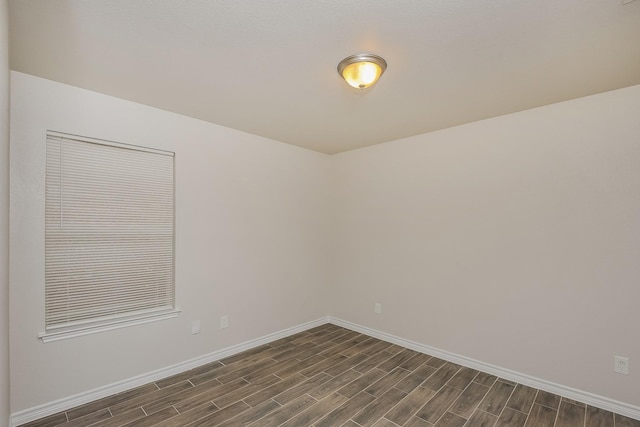 3153 Evangeline Rd, Fort Worth, TX 76140 - unfurnished room with baseboards and dark wood-style floors