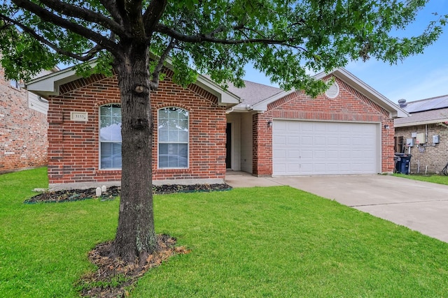 3153 Evangeline Rd, Fort Worth, TX 76140 - view of front of home featuring brick siding, a garage, driveway, and a front yard