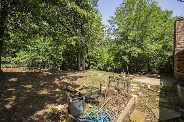 3001 Jennifer Ave, Denison, TX 75020 - view of yard with a garden